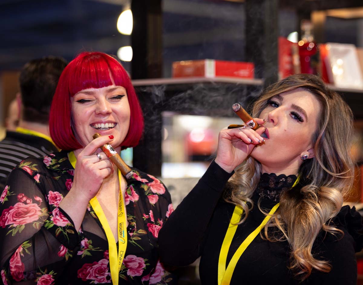 TPE female attendees Smoking Cigars